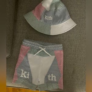 Kith trunks and hat worn once.